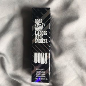 brand new uoma beauty lip gloss